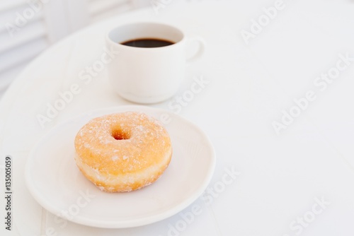 Cup of coffee and donut