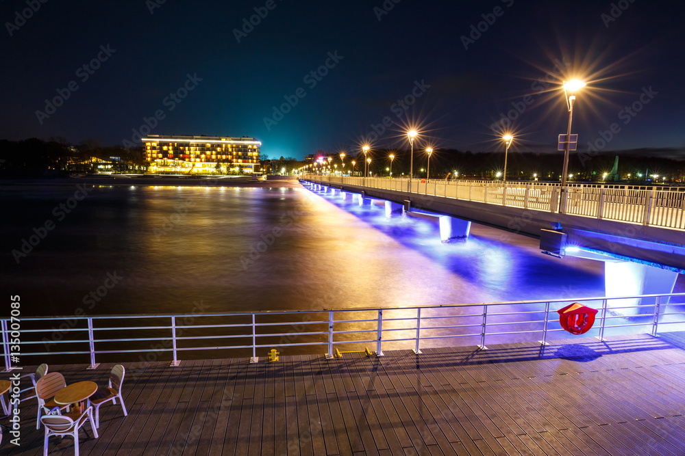 Fototapeta premium Concrete pier in Kolobrzeg, long exposure shot at sunset
