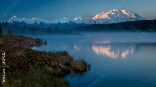 AUGUST 28, 2016 - Mount Denali at Wonder Lake, previously known as Mount McKinley, the highest mountain peak in North America, at 20, 310 feet above sea level. Located in the Alaska Range, Denali National Park and Preserve, Alaska - shot at Sunrise.