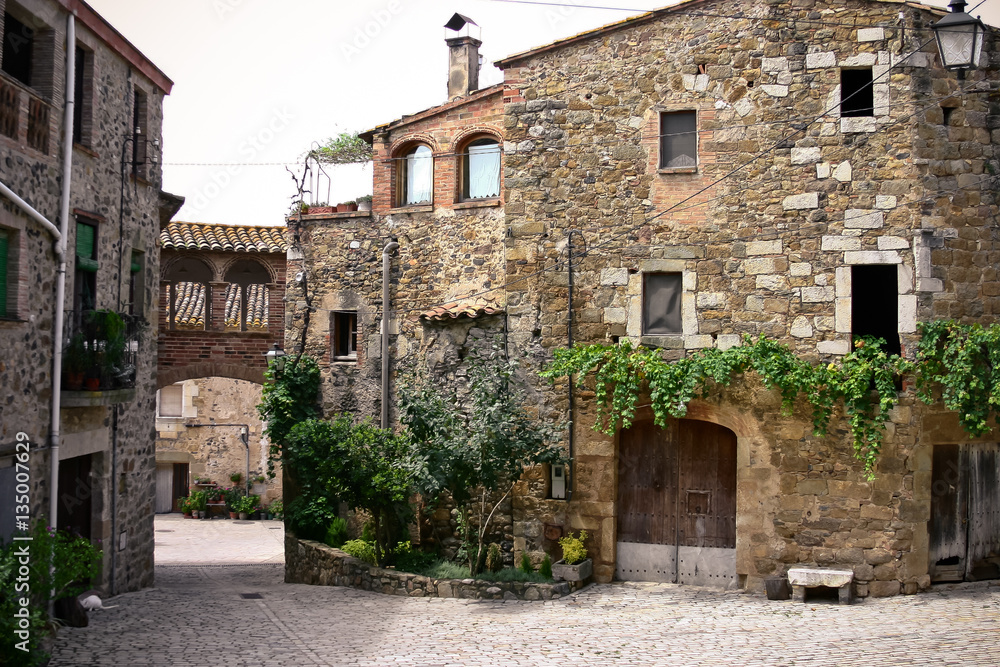 The old yard in the village of Pubol in Spain.