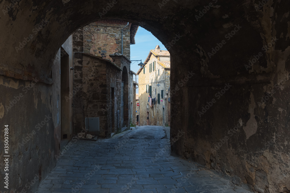 Hidden streets and corners of the arches in Montalcino, Tuscany.