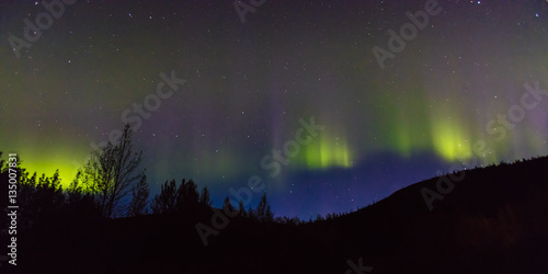 AUGUST 30, 2016 - Aurora Borealis or Northern Lights illuminate the night sky from Kantishna, Alaska - Mnt. Denali National Park © spiritofamerica