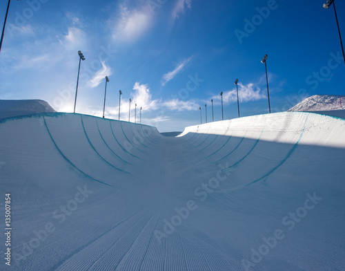Empty winter snow halfpipe