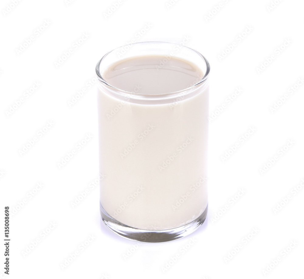 Soy milk in a glass on a white background Soy milk in a glass on a white background