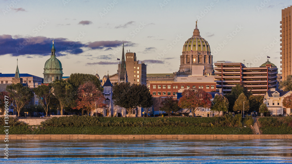 OCTOBER 25, 2016 - HARRISBURG, PENNSYLVANIA, City skyline and State Capitol shot at dusk from Susquehanna River, PA