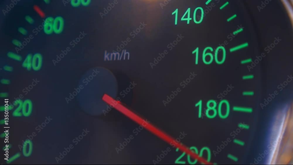 Car speedometer needle is rapidly approaching to the maximum value 200 km/h. Vehicle vibration adds adrenaline and increases the feeling of a strong acceleration Car speedometer needle is rapidly approaching to the maximum value 200 km/h. Vehicle vibration adds adrenaline and increases the feeling of a strong acceleration