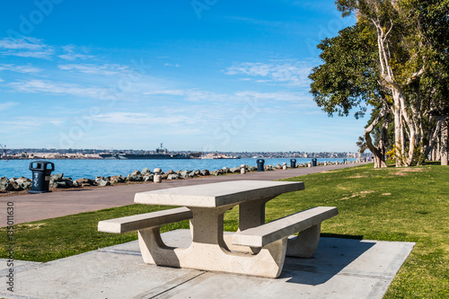 Picnic table at Embarcadero Marina Park North, with San Diego bay in the background.