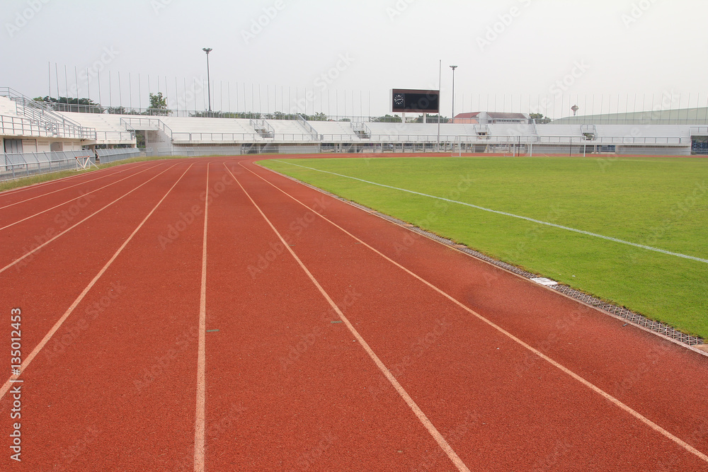 Obraz premium running track and stadium field