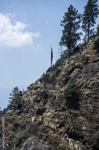The narrow steep staircases path leading to the Tiger's Nest, Taktshang monastery, Bhutan photo