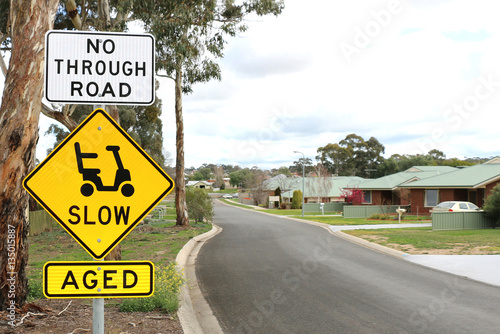 Slow and aged signs at the entrance of a retirement village