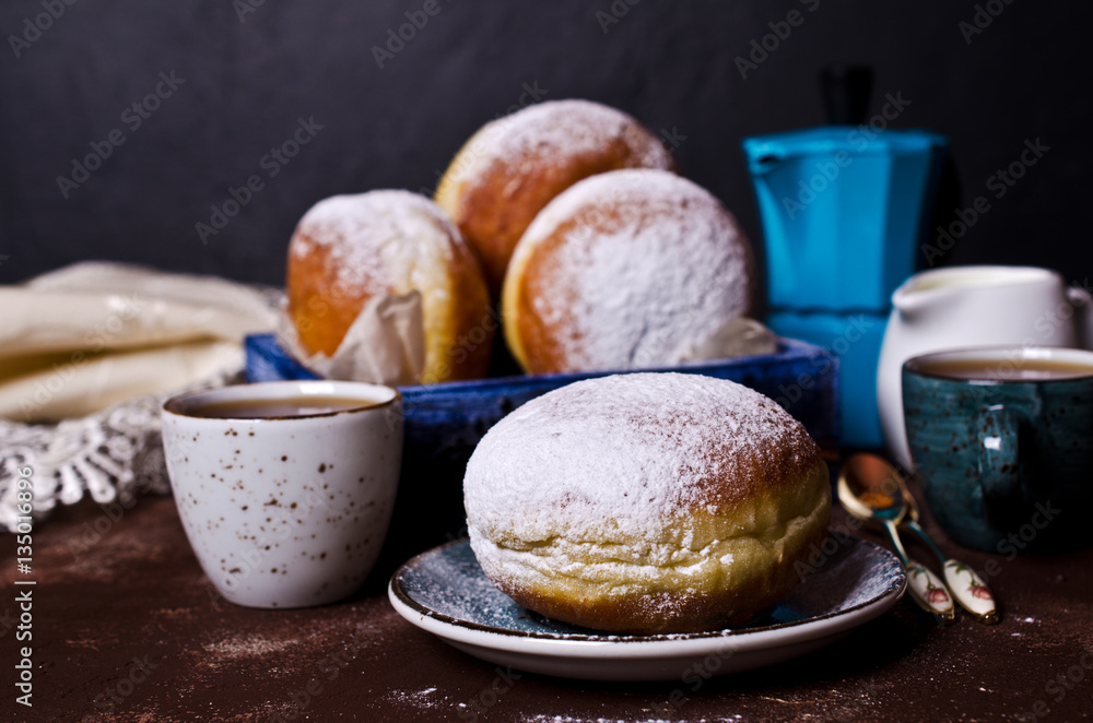 Fotografie Traditional donuts with powdered sugar
