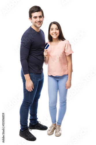 Cute couple with a credit card