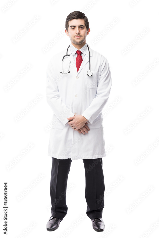 Handsome young doctor in a studio Handsome young doctor in a studio