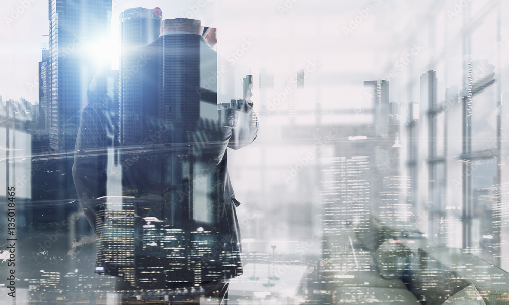 Exposure of businessman and cityscape . Mixed media Exposure of businessman and cityscape . Mixed media