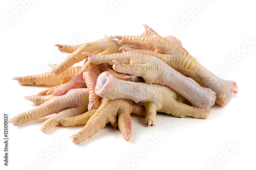 bunch of chicken feet isolated on white background