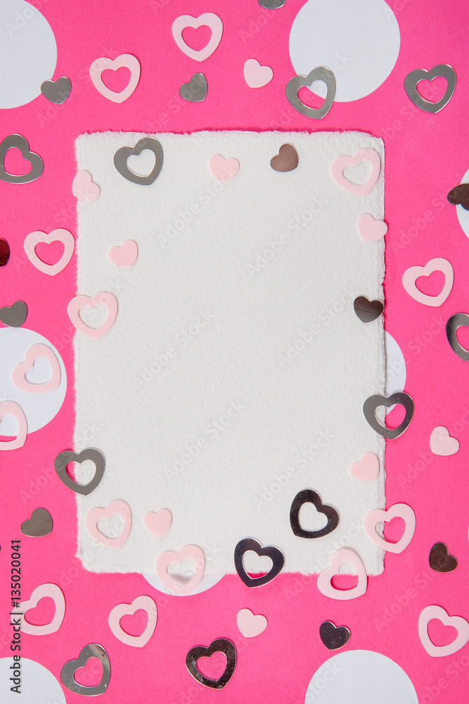 Valentines day background. Colorful hearts and empty letter on a pink background.
