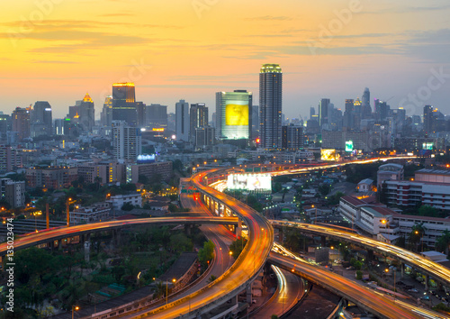 Bangkok Expressway and Highway top view during twilight time,expressway is a important facility for rush hour in Bangkok ,Thailand