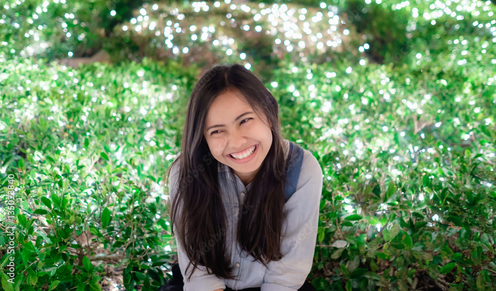 beautiful asian girl with colorful green bokeh beautiful asian girl with colorful green bokeh