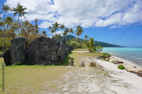 Tropical shore with ancient stone structure, the marae Anini on the south of the island of Huahine Iti, French Polynesia
 photo