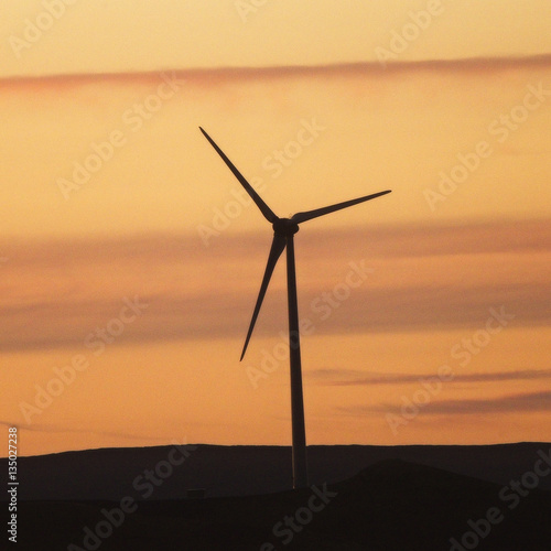 Wind Turbine at sunset, Shetland, Scotland, UK.
