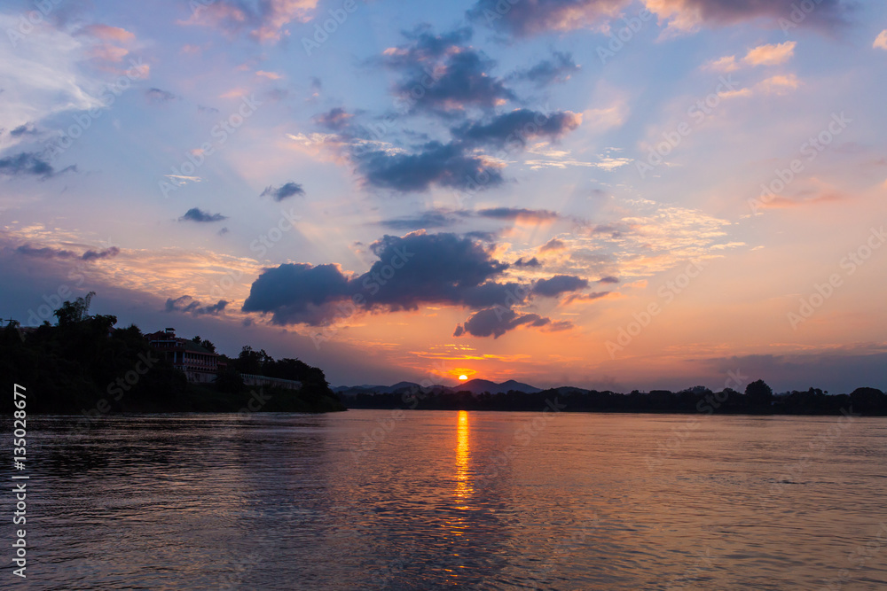 Beautiful sunset in a Mekong River at Chiang Khan, Thailand Beautiful sunset in a Mekong River at Chiang Khan, Thailand