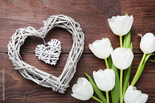 Fototapeta Naklejka Na Ścianę i Meble -  Bouquet of tulips on brown wooden table