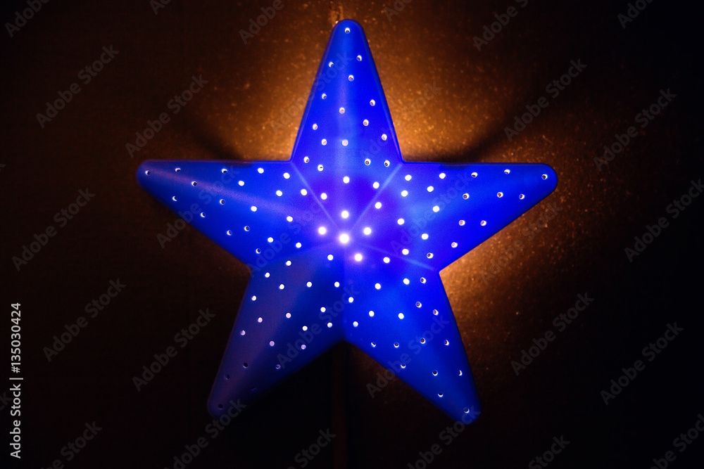 nightlight in the shape of a star in the children's room nightlight in the shape of a star in the children's room
