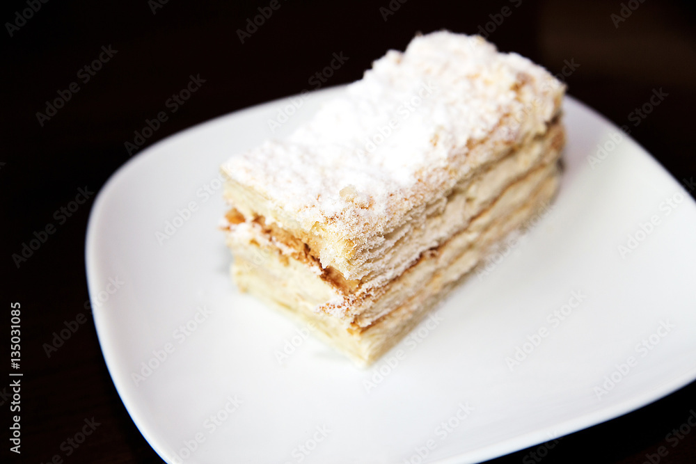 napoleon cake on white plate napoleon cake on white plate