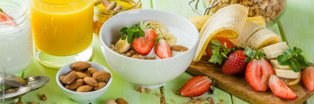 Breakfast - strawberry and banana muesli with yogurt Breakfast - strawberry and banana muesli with yogurt