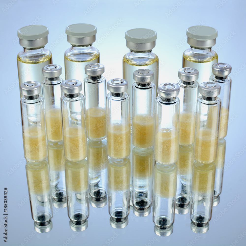 bottle for liquid drug and bacteria on glass