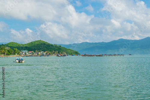Sea landscape with boats near island shore - the South China sea - Vietnam, Nha Trang bay