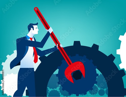 Businessman with wrench and cogs