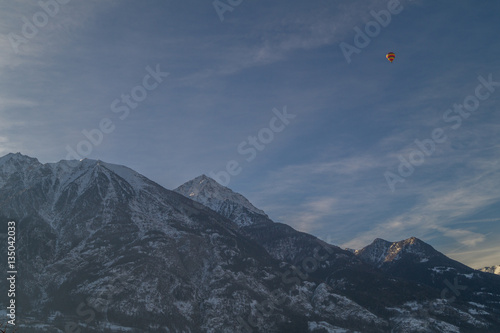 mountain scenery, mountains with hot air balloon flying in the sky