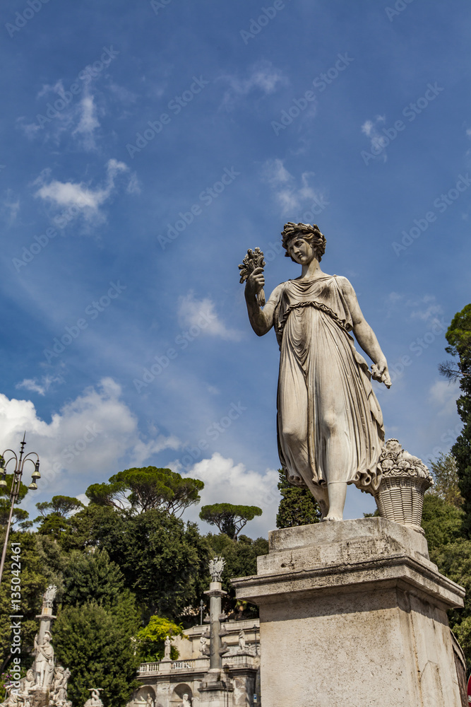 Goddess of abundance statue at Piazza del Popolo in Rome