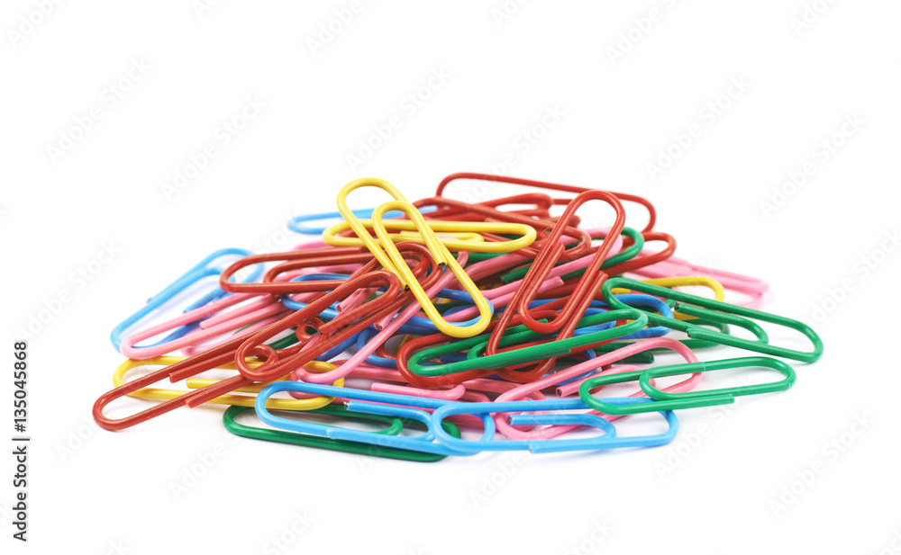 Pile of colorful office clips isolated