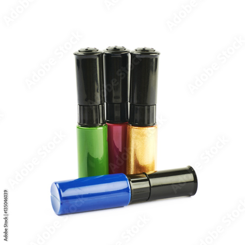 Four bottles of nail polish isolated