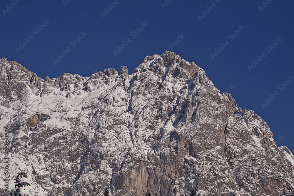 Beautiful winter landscape, Tauern Austrian Alps covered by snow in winter against blue sky