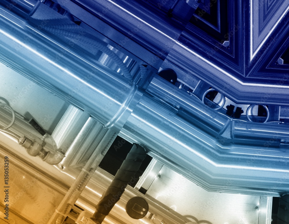 Blue and sepia aluminum background. Metal pipes and abstract technological components. Industrial concept. Blue and sepia aluminum background. Metal pipes and abstract technological components. Industrial concept.
