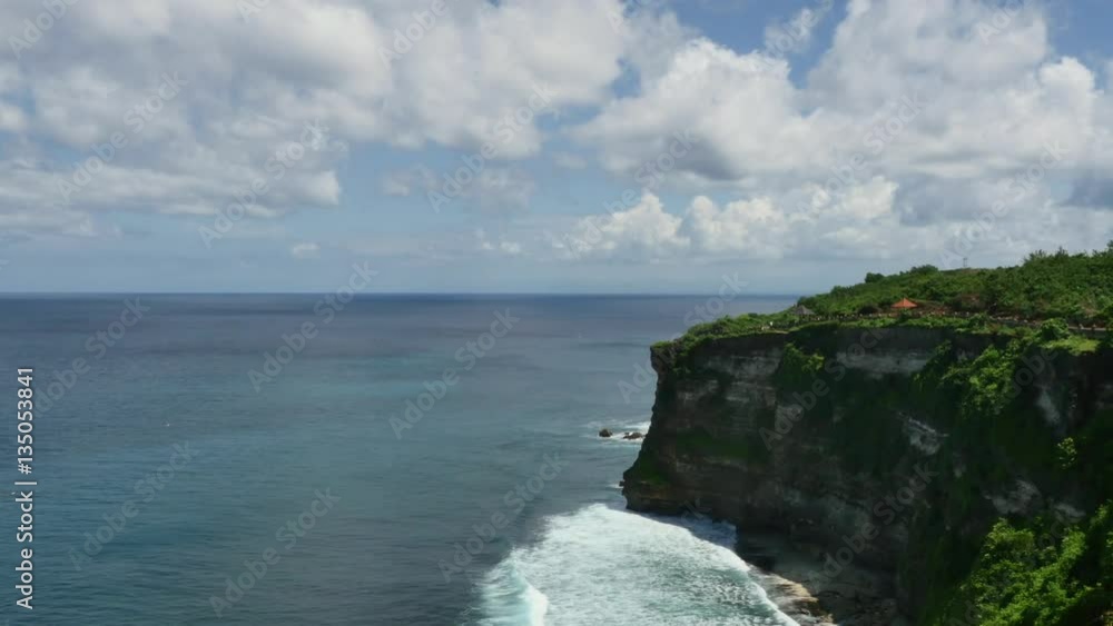 The general plan of paradise sea sky rocks waves in Indonesia. Beautiful place. Ideal for background. The general plan of paradise sea sky rocks waves in Indonesia. Beautiful place. Ideal for background.