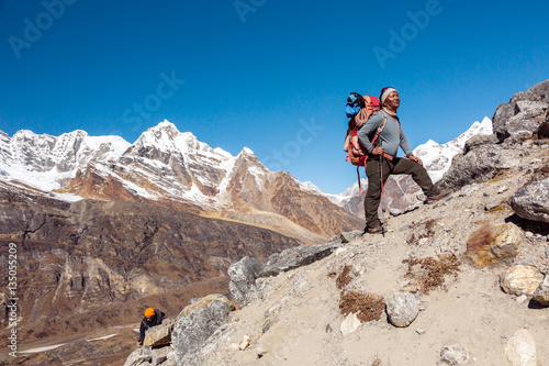 Team of Mountain Climbers led by Nepalese Sherpa Guide