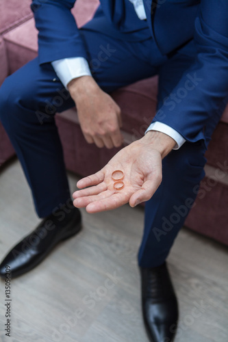 wedding rings on a man's hand