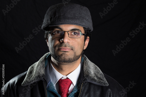 Middle Eastern metrosexual man in studio photo