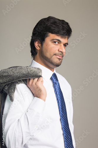 Middle Eastern metrosexual man in studio photo