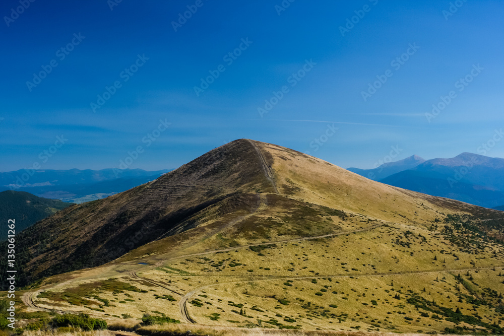 minimalistic mountain shape only sky and mountain green blue road way path adventure travel minimalistic mountain shape only sky and mountain green blue road way path adventure travel