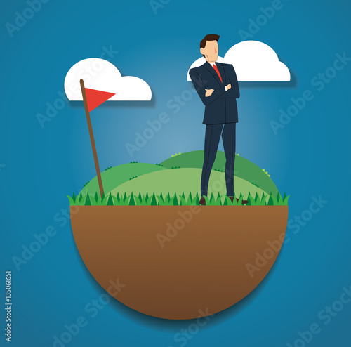 standing businessman on the green field and golf flag. reach to success. Business concept. photo