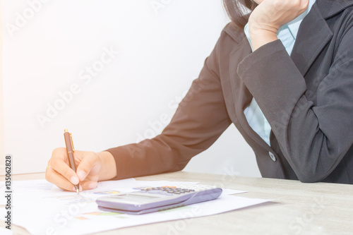 Businesswomen hands check document with financial data, Concept Business and financial  photo