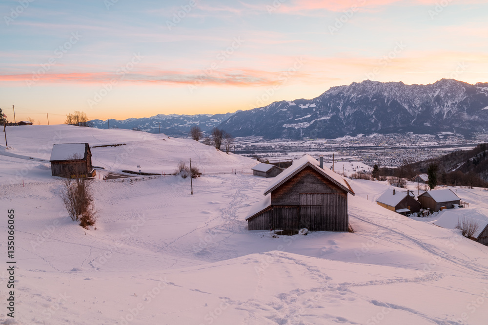 Swiss Winter - Hut and mountain covered in snow Swiss Winter - Hut and mountain covered in snow