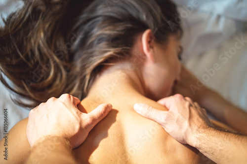 Fotografija Boyfriend giving massage for his girlfriend