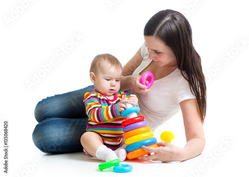 Cute baby playing with her ...