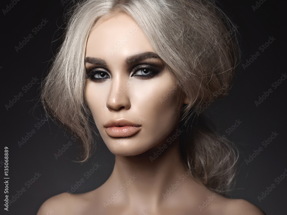 Beautiful blonde woman with smoky eyes makeup Beautiful blonde woman with smoky eyes makeup